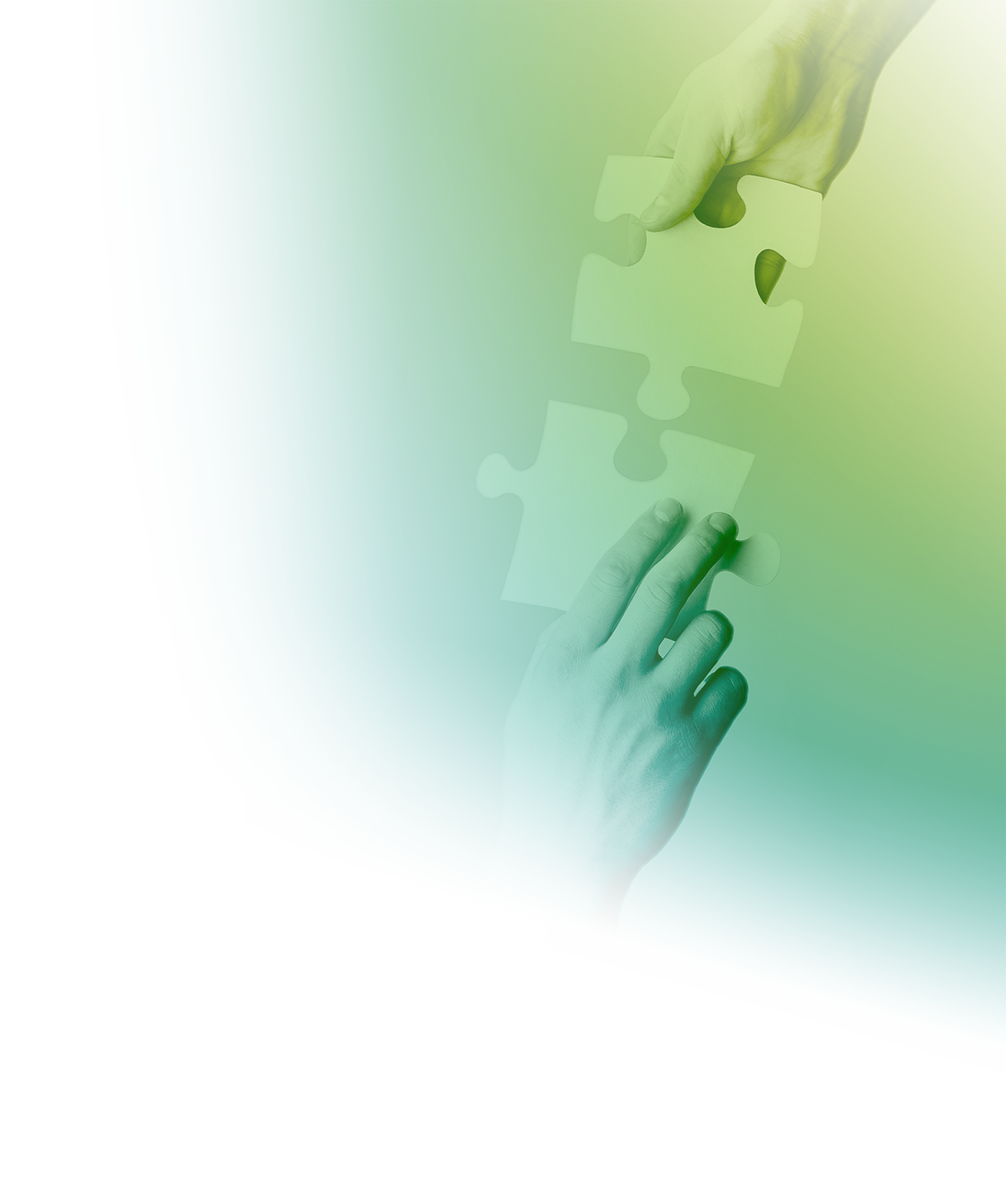 Hands holding puzzle pieces